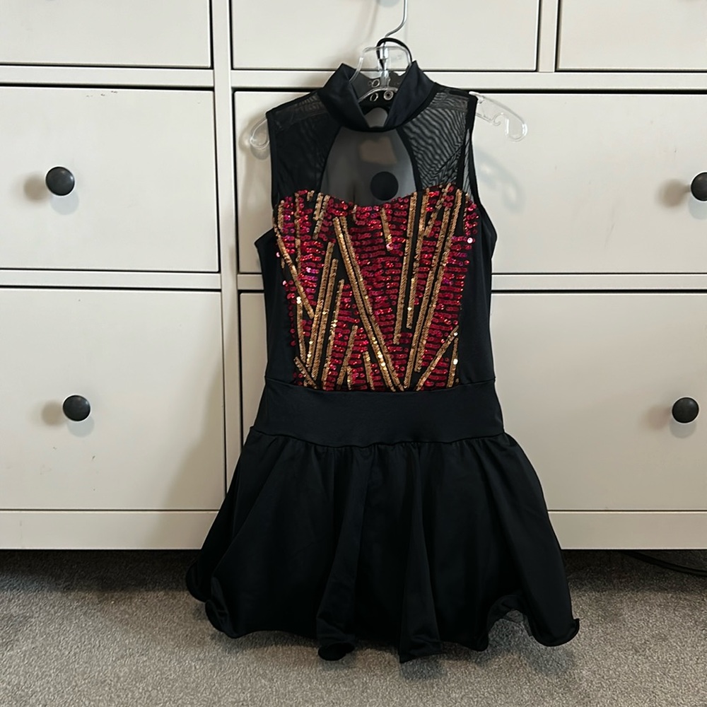 red and gold sparkly black dance costume